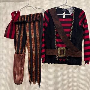 Chasing Fireflies Red and Black Pirate Costumes.
One boy’s one girl’s.